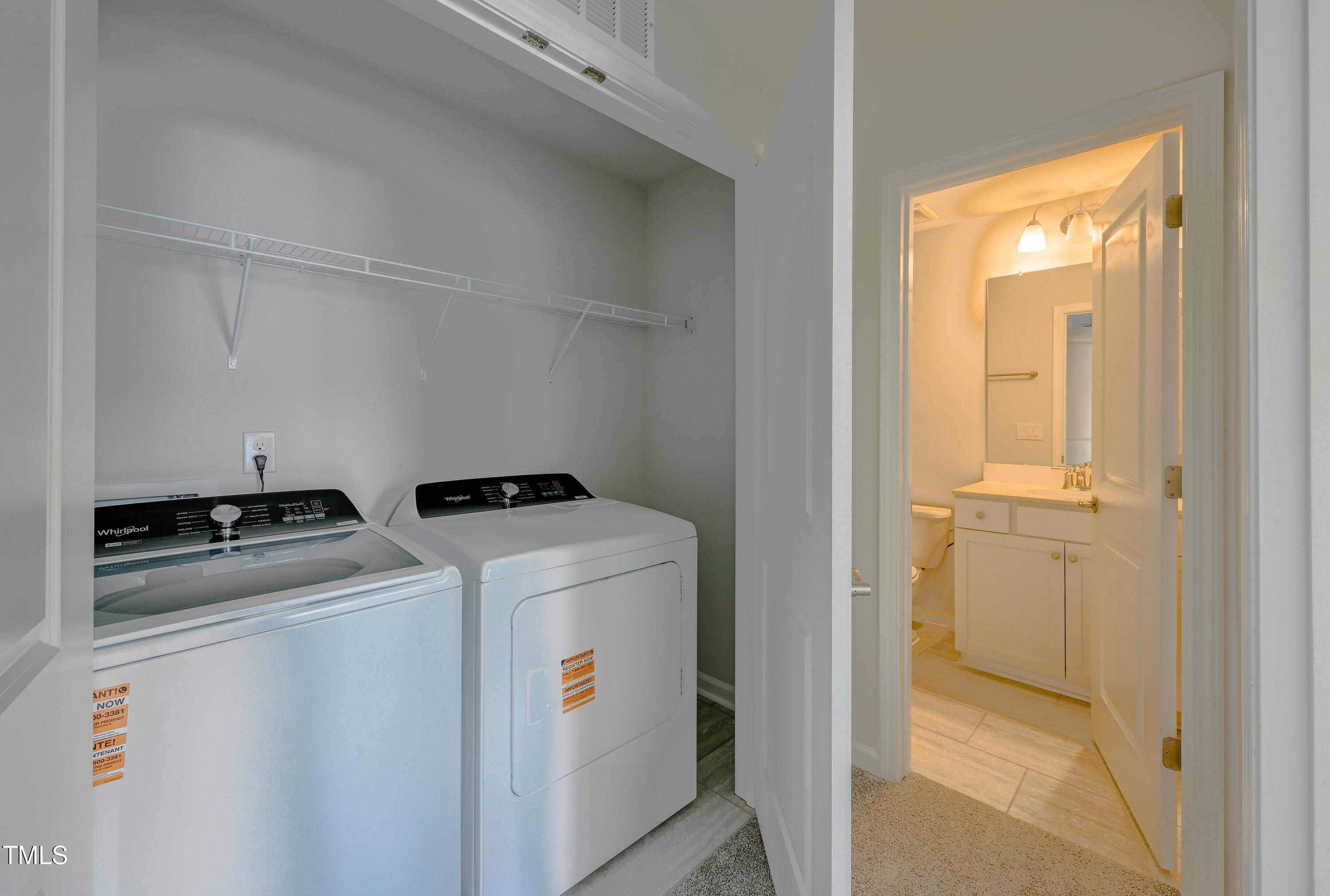 1511 Tamarisk Lane Durham, NC 27703 - Photo 25 of 26 a utility room with dryer and washer