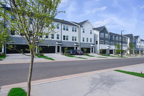 a view of a building with a street
