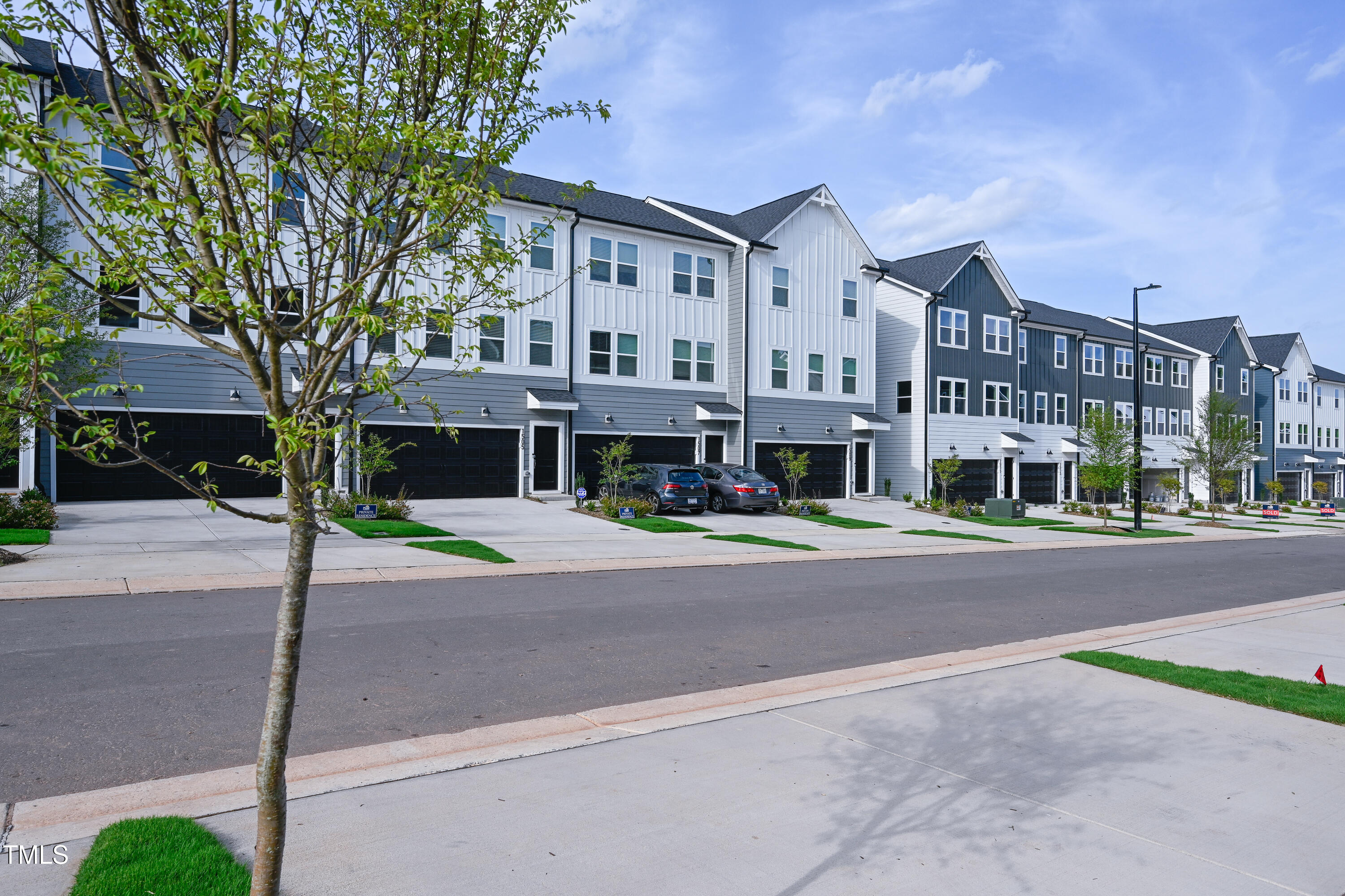 1511 Tamarisk Lane Durham, NC 27703 - Photo 3 of 26 a view of a building with a street