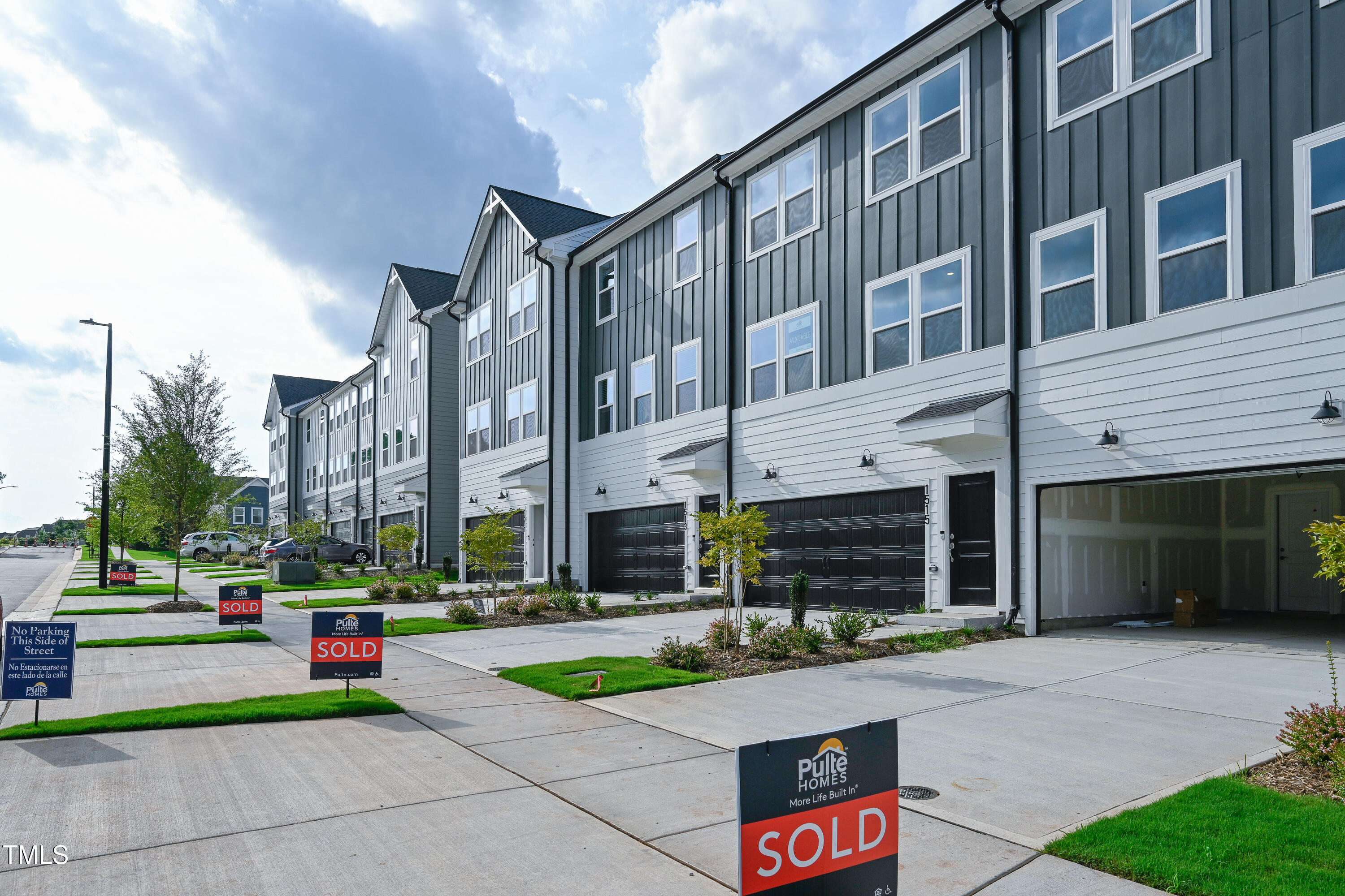 1511 Tamarisk Lane Durham, NC 27703 - Photo 4 of 26 a front view of a building with street