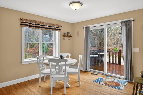 a bathroom with a sink toilet and a mirror