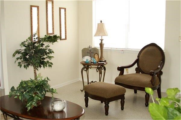 140 North Summit Road McCleary, WA 98557 - Photo 3 of 6 a living room with furniture and a potted plant
