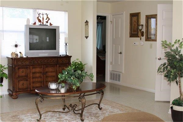 140 North Summit Road McCleary, WA 98557 - Photo 5 of 6 a living room with furniture and a potted plant
