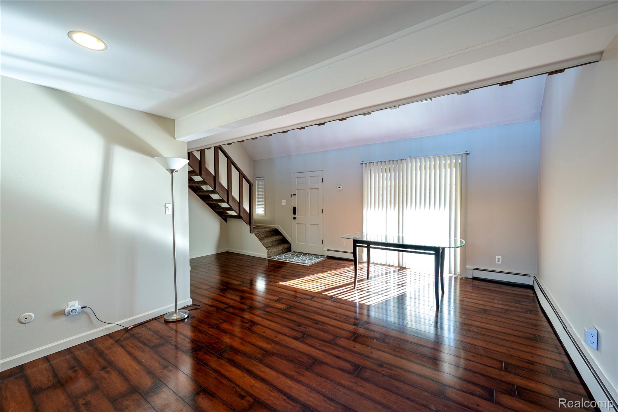 2344 West 14 Mile Road, Unit 7 Royal Oak, MI 48073 - Photo 12 of 23 Living Room with hardwood floors