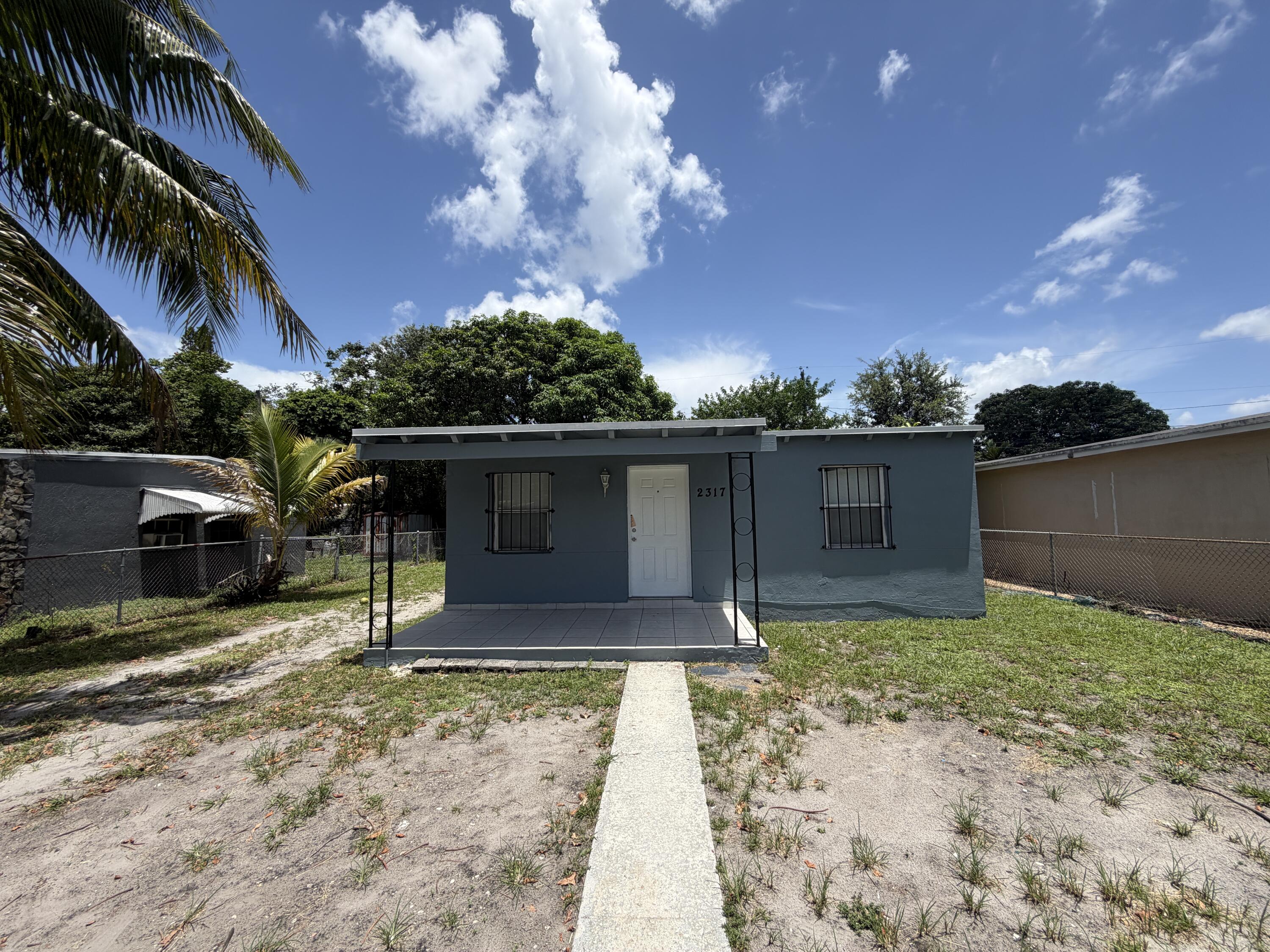 2317 Rutland Street Opa-Locka, FL 33054 - Photo 2 of 11 8FD7C332-B772-44E1-8DD6-558308F0AE0C