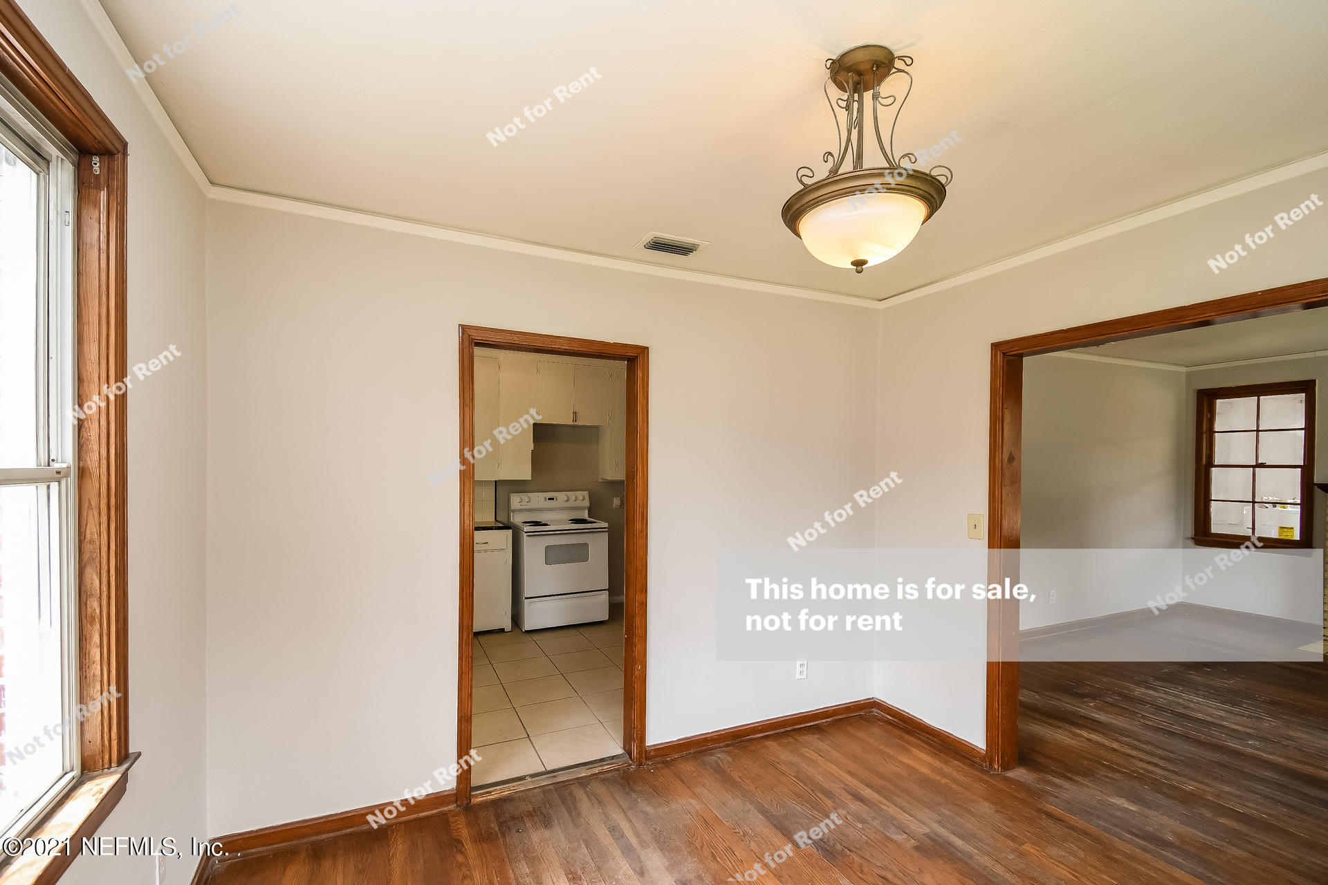 4659 Post Street Jacksonville, FL 32205 - Photo 13 of 25 a view of a room with wooden floor and door