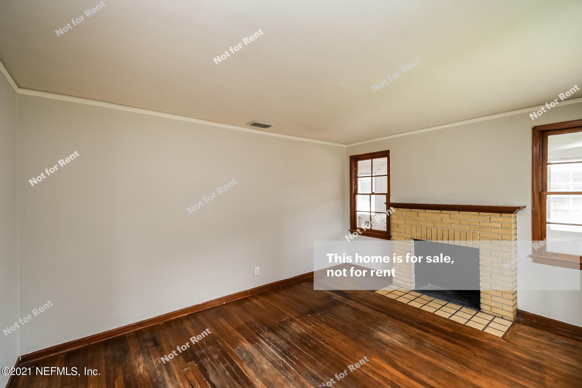 4659 Post Street Jacksonville, FL 32205 - Photo 14 of 25 a view of an empty room with window and wooden floor