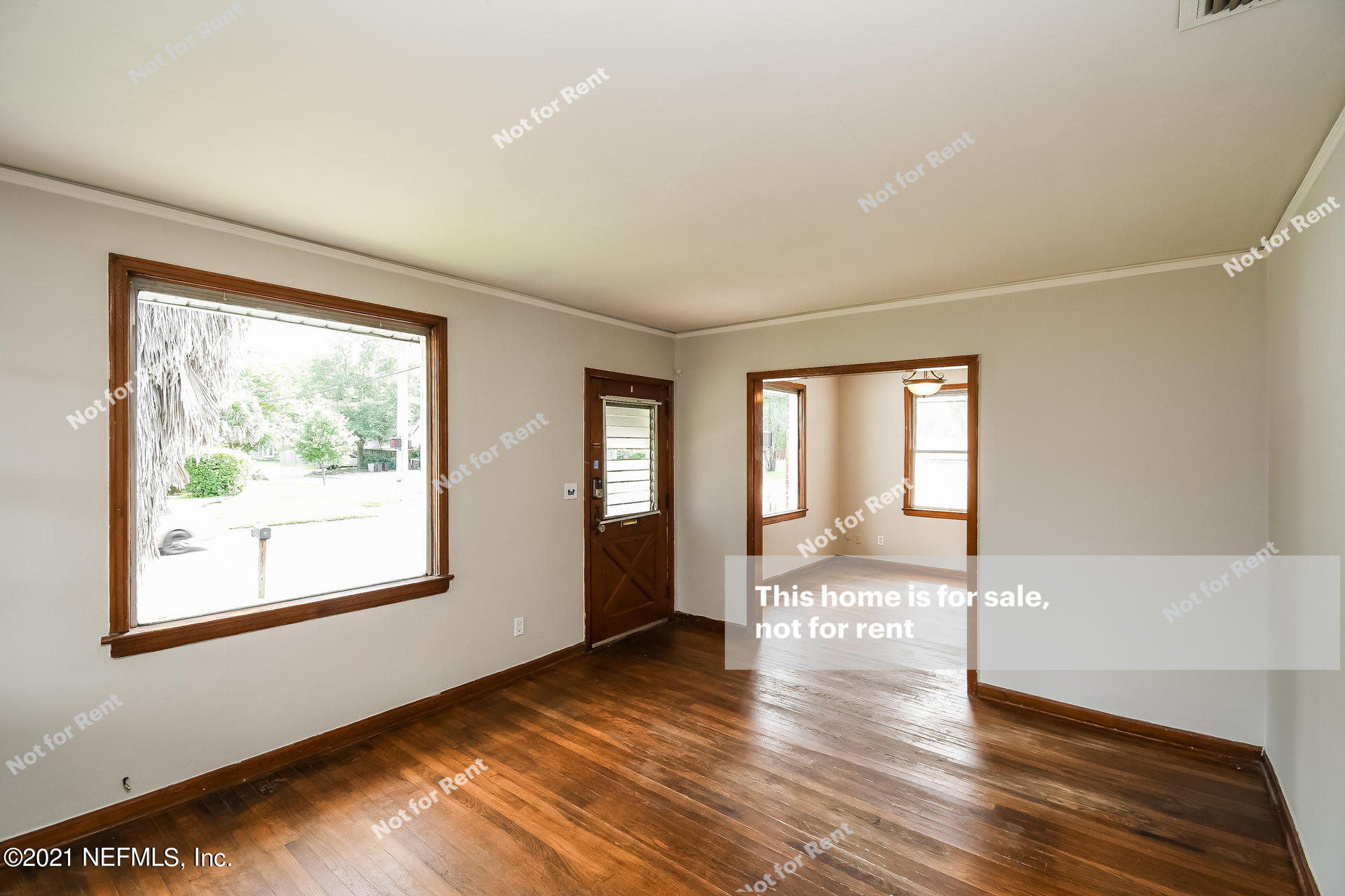 4659 Post Street Jacksonville, FL 32205 - Photo 15 of 25 a view of an empty room with wooden floor and a window