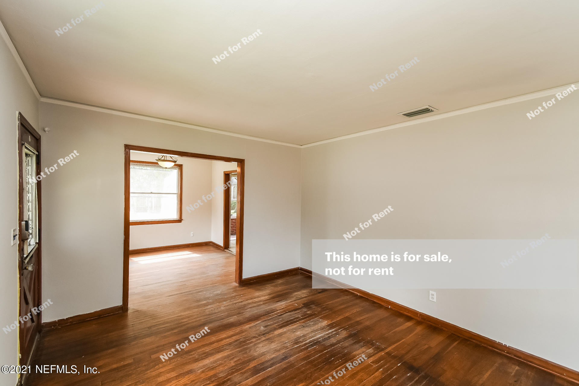 4659 Post Street Jacksonville, FL 32205 - Photo 16 of 25 a view of an empty room with wooden floor and a window