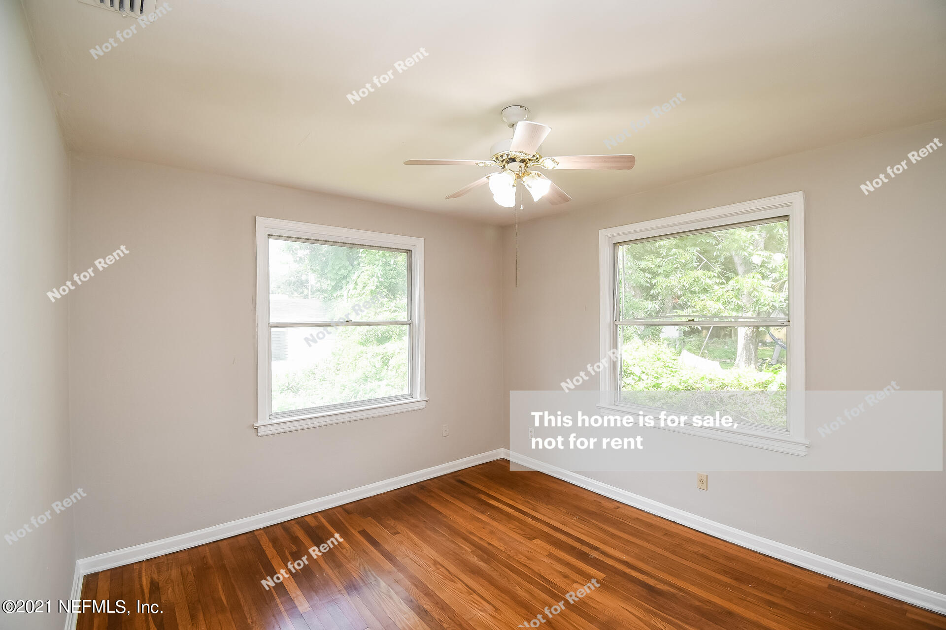 4659 Post Street Jacksonville, FL 32205 - Photo 19 of 25 a view of an empty room with wooden floor and a window