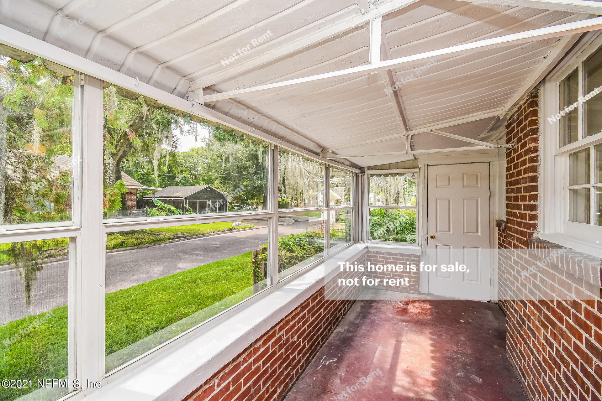 4659 Post Street Jacksonville, FL 32205 - Photo 22 of 25 a view of an empty room with wooden floor and windows