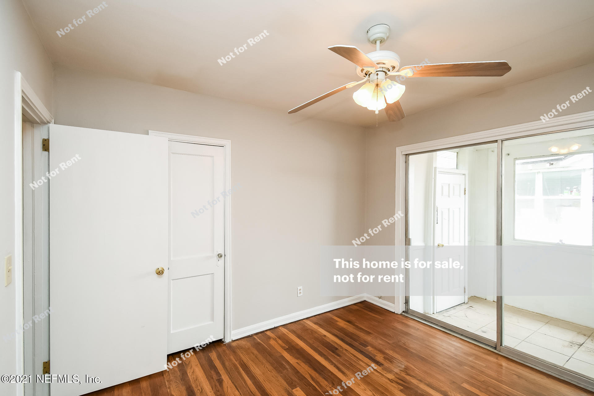 4659 Post Street Jacksonville, FL 32205 - Photo 4 of 25 a view of an empty room with window and wooden floor