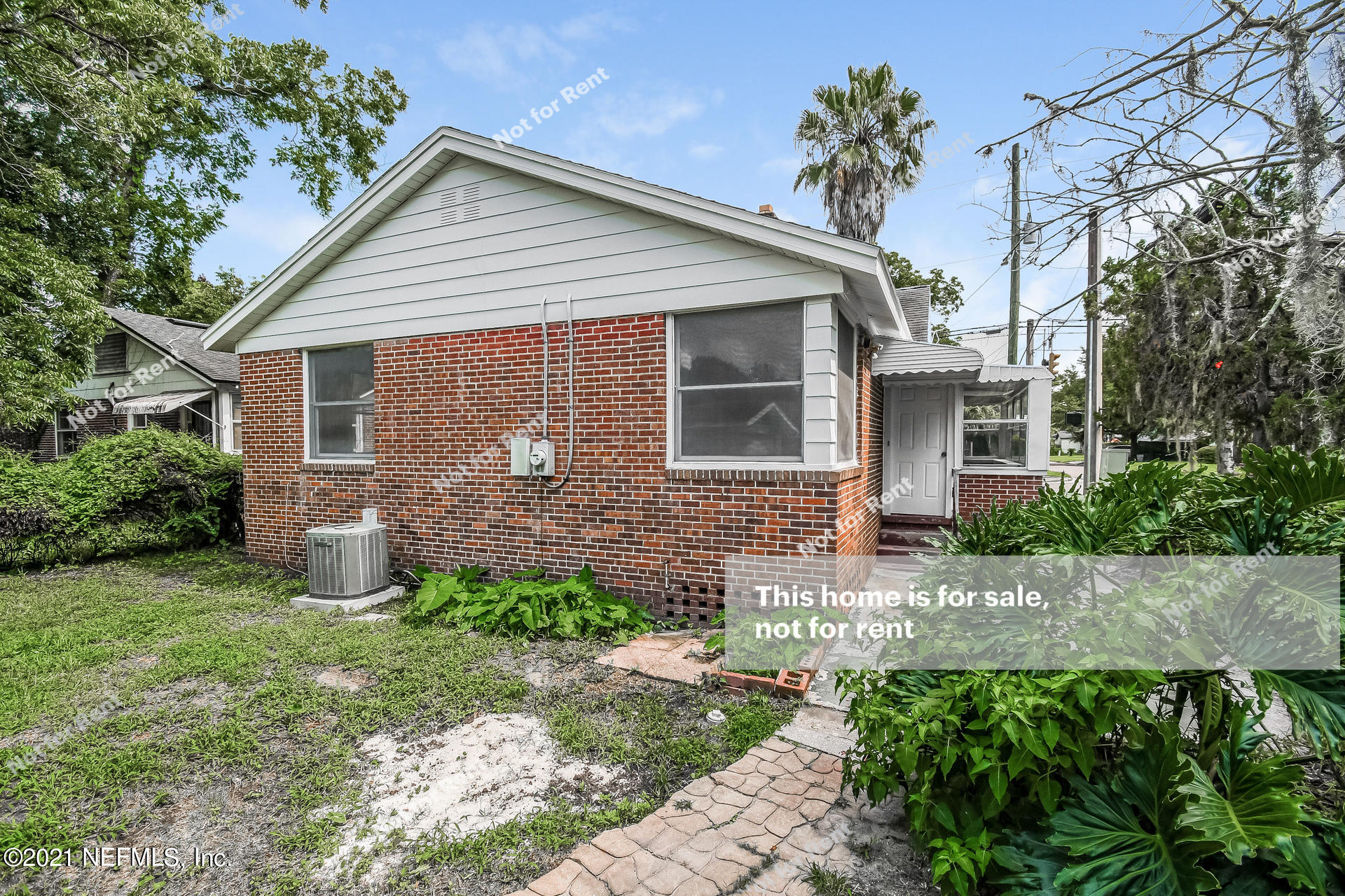 4659 Post Street Jacksonville, FL 32205 - Photo 6 of 25 a front view of a house with a garden
