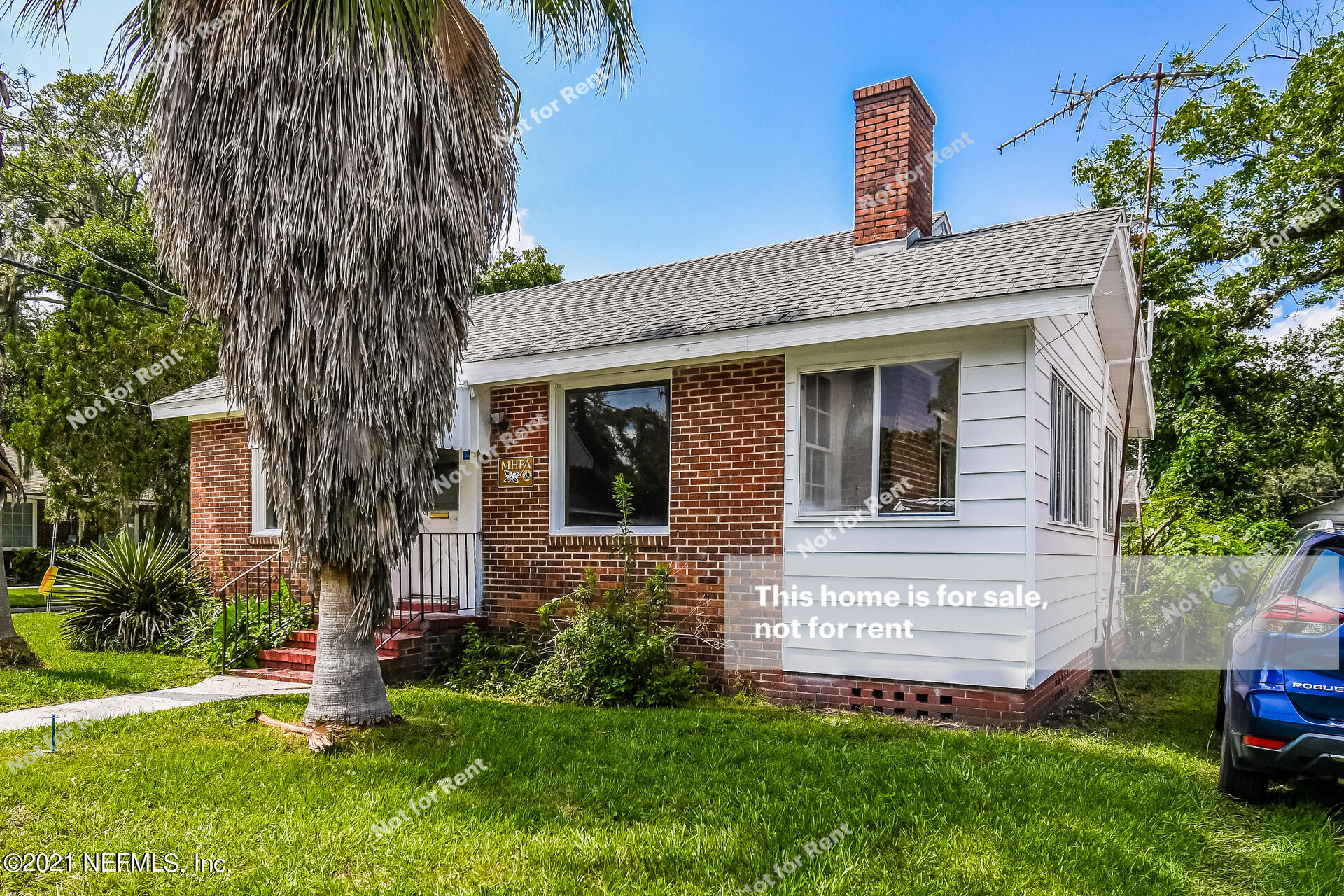 4659 Post Street Jacksonville, FL 32205 - Photo 8 of 25 a front view of a house with a garden