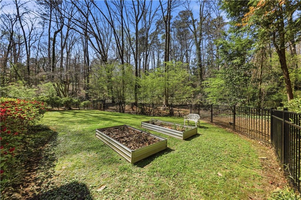 505 Hollydale Court Northwest Atlanta, GA 30342 - Photo 101 of 117 a garden view with a sitting space