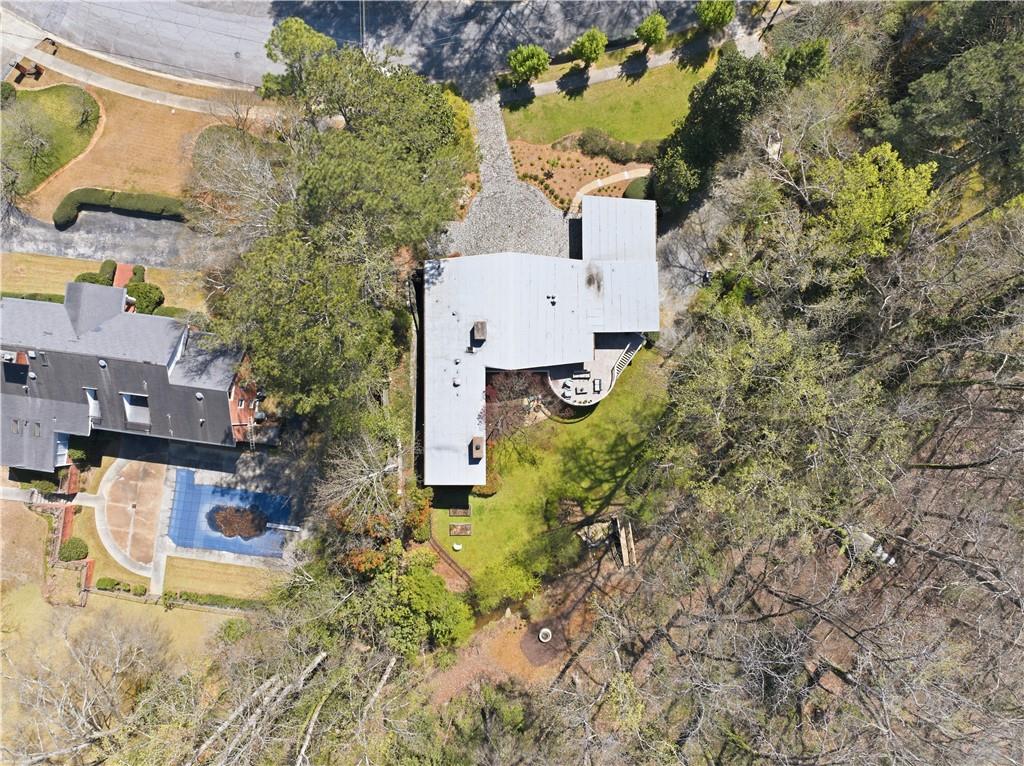 505 Hollydale Court Northwest Atlanta, GA 30342 - Photo 106 of 117 an aerial view of residential houses with outdoor space and trees