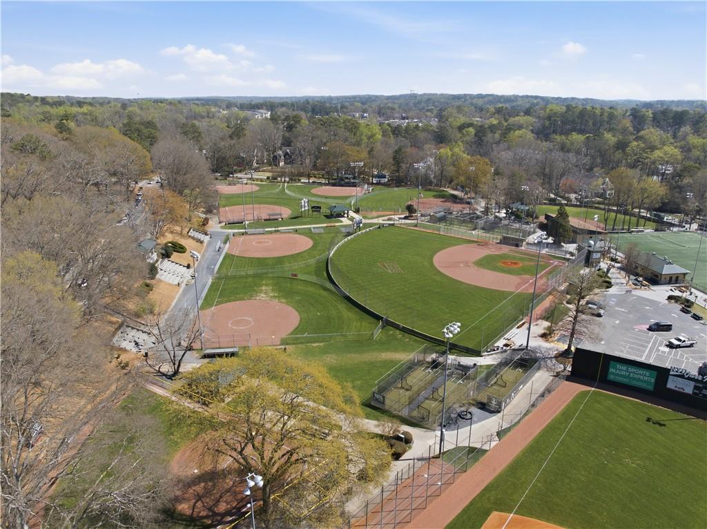 505 Hollydale Court Northwest Atlanta, GA 30342 - Photo 108 of 117 an aerial view of a house with a garden and lake view