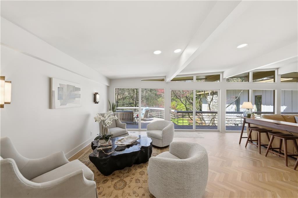 505 Hollydale Court Northwest Atlanta, GA 30342 - Photo 20 of 117 a living room with furniture and a large window