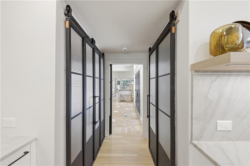505 Hollydale Court Northwest Atlanta, GA 30342 - Photo 25 of 117 a view of hallway with wooden floor