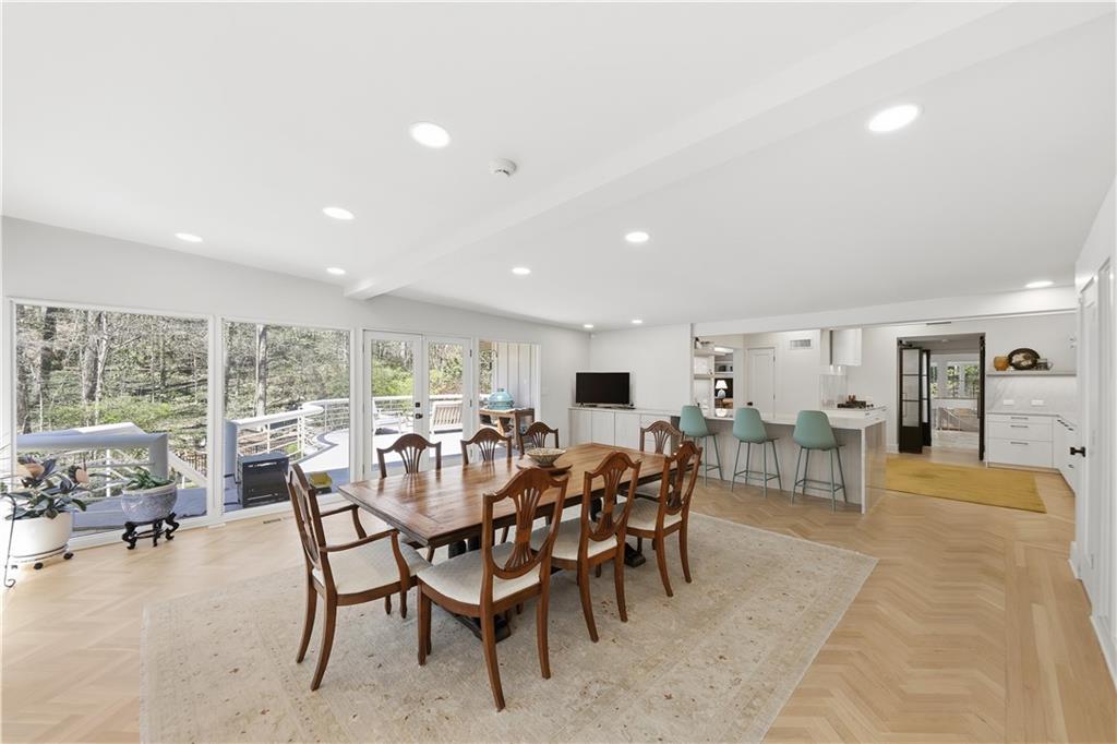 505 Hollydale Court Northwest Atlanta, GA 30342 - Photo 34 of 117 a view of a dining room with furniture window and outside view