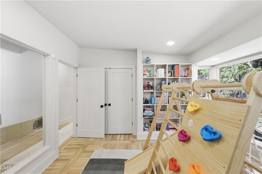 505 Hollydale Court Northwest Atlanta, GA 30342 - Photo 37 of 117 a view of a room with toys and wooden floor
