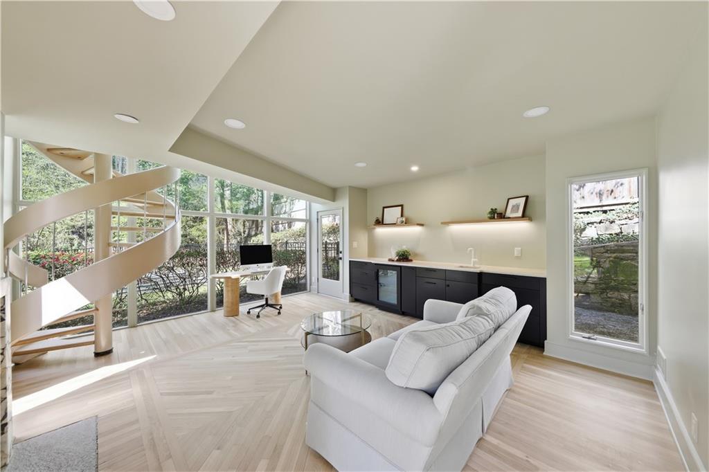 505 Hollydale Court Northwest Atlanta, GA 30342 - Photo 87 of 117 a living room with furniture and a large window