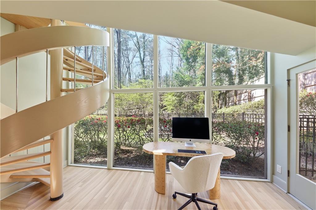 505 Hollydale Court Northwest Atlanta, GA 30342 - Photo 90 of 117 a view of a dining room with furniture window and wooden floor