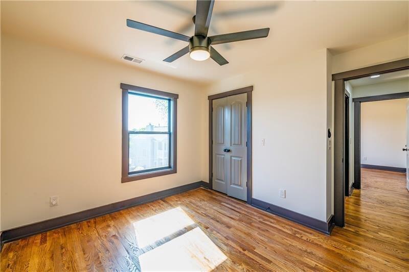 767 Terry Street Southeast, Unit B Atlanta, GA 30315 - Photo 17 of 37 a view of a room with wooden floor and a window