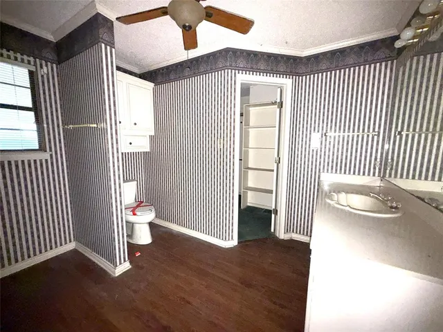 a view of a livingroom with wooden floor