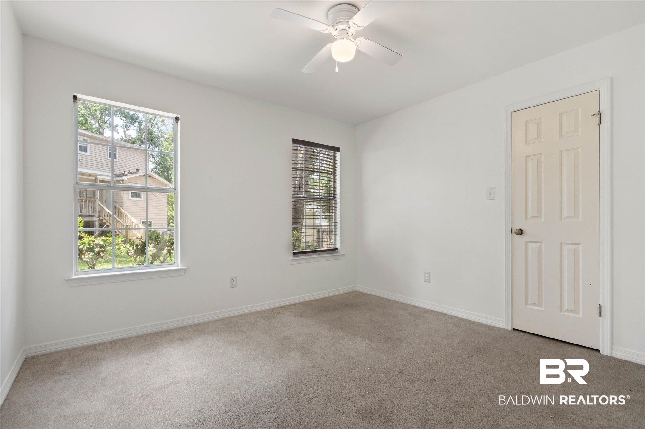 3032 Autumn Ridge Drive West Mobile, AL 36695 - Photo 14 of 20 Carpeted spare room featuring plenty of natural light and a ceiling fan