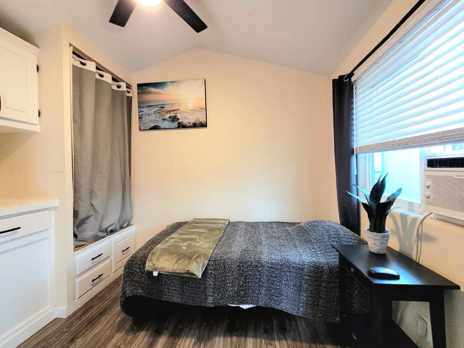 8880 Auburn Folsom Rd Road, Unit 25 Granite Bay, CA 95746 - Photo 11 of 19 a bedroom with a bed dresser and a window