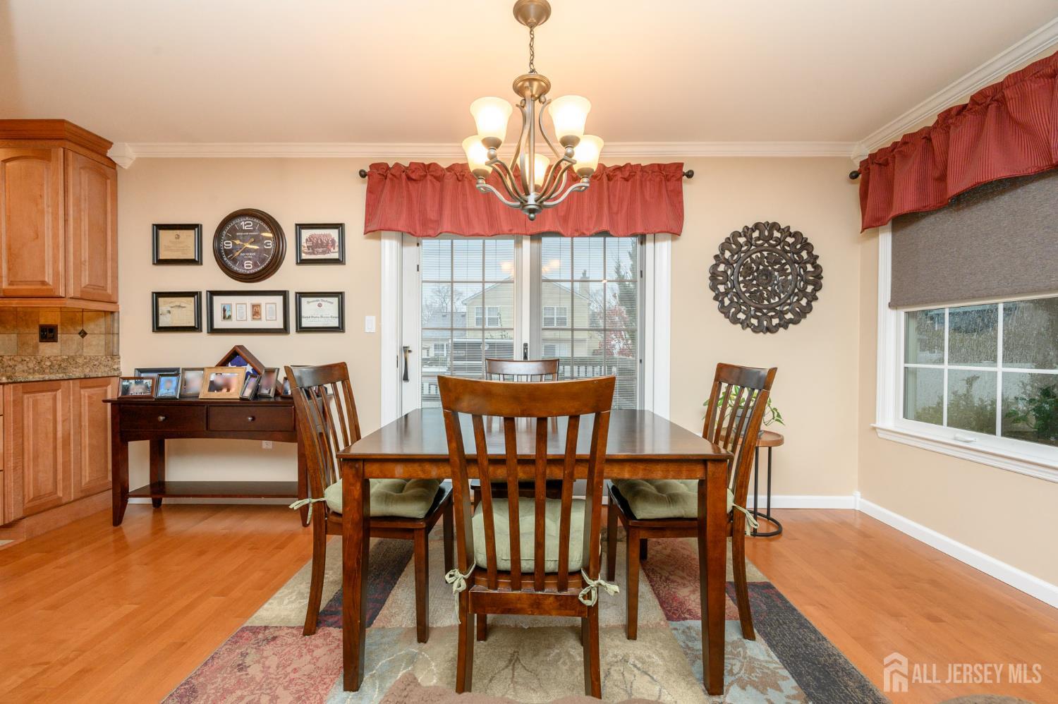 12 Diamond Lane Howell, NJ 07731 - Photo 15 of 47 a view of a dining room with furniture window and wooden floor