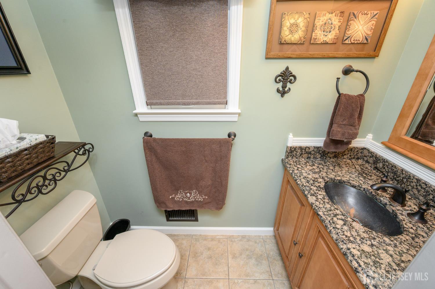 12 Diamond Lane Howell, NJ 07731 - Photo 19 of 47 a bathroom with a toilet and a sink