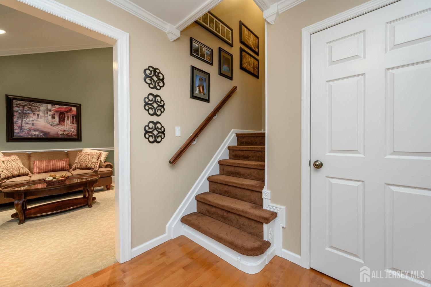 12 Diamond Lane Howell, NJ 07731 - Photo 20 of 47 a view of entryway and hall with wooden floor