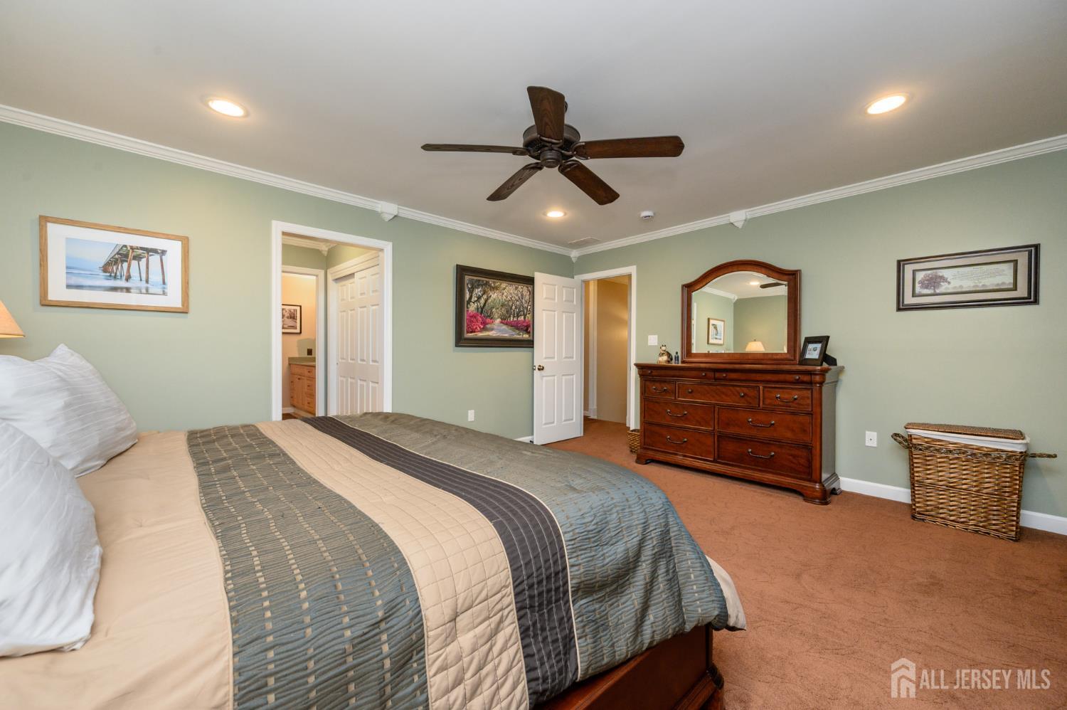 12 Diamond Lane Howell, NJ 07731 - Photo 22 of 47 a bedroom with a bed and a dresser