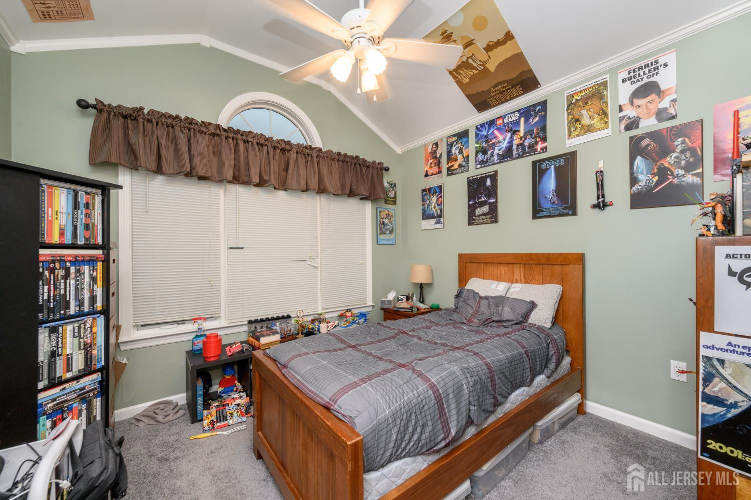 12 Diamond Lane Howell, NJ 07731 - Photo 31 of 47 a bedroom with bed and a book shelf