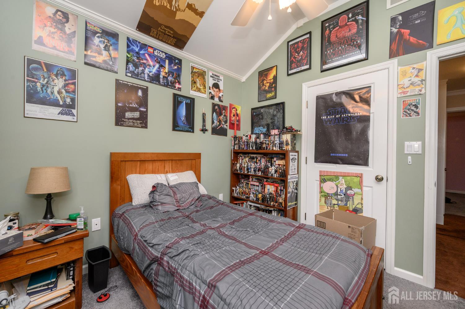 12 Diamond Lane Howell, NJ 07731 - Photo 32 of 47 a bed sitting in a bedroom next to a lamp