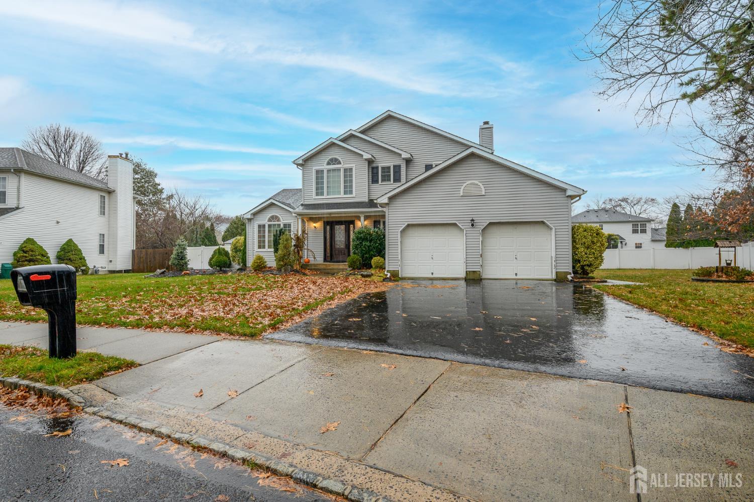 12 Diamond Lane Howell, NJ 07731 - Photo 47 of 47 a front view of a house with garden