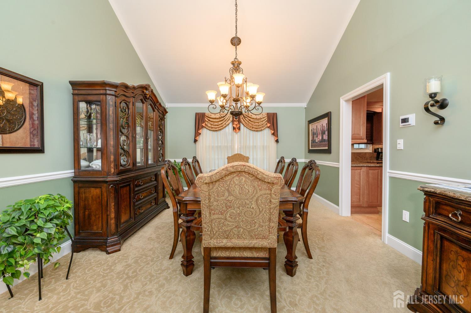 12 Diamond Lane Howell, NJ 07731 - Photo 7 of 47 a dining room with furniture and chandelier