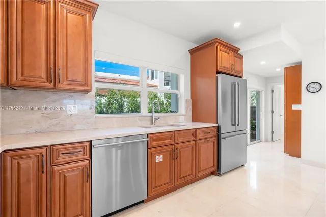 a view of a bathroom with a glass shower door