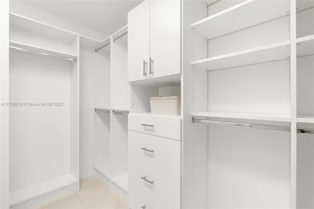 a view of a house with a yard and plants