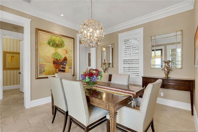 a bathroom with a granite countertop sink a mirror and shower