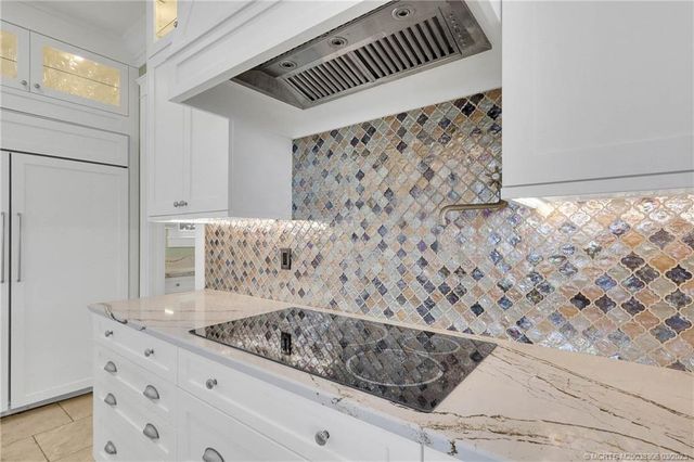 a view of hallway with wooden floor