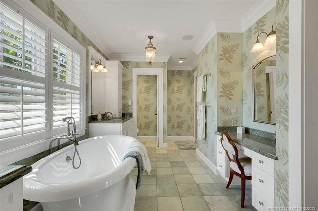 a bathroom with a shower and toilet