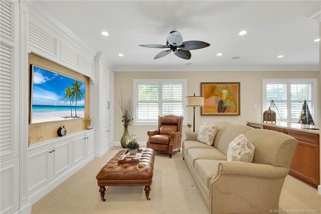 a bathroom with a toilet a sink and a mirror