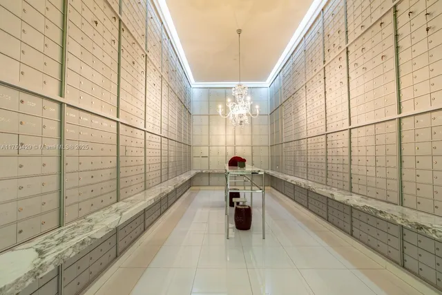 a bathroom with a sink toilet and mirror