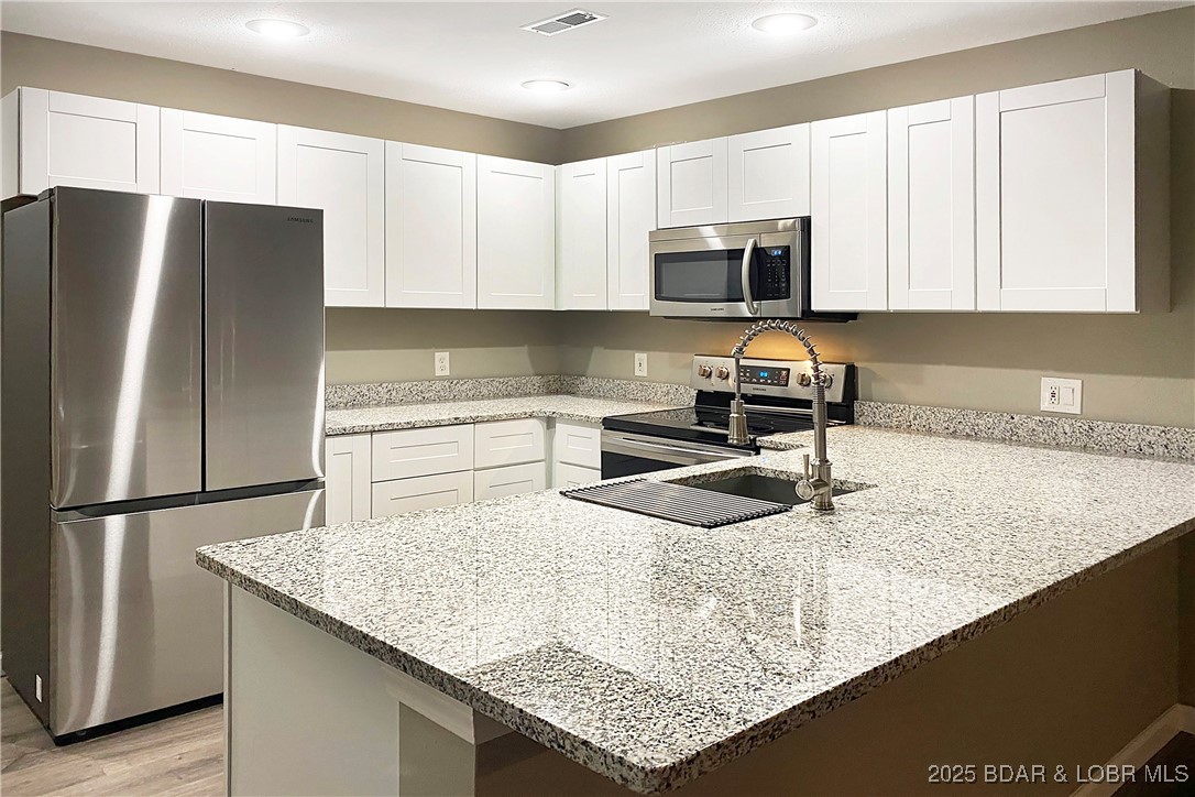 182 Sac Road, Unit C401 Sunrise Beach, MO 65079 - Photo 1 of 30