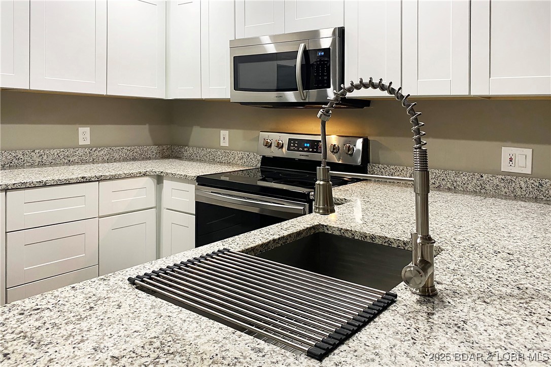 182 Sac Road, Unit C401 Sunrise Beach, MO 65079 - Photo 2 of 30