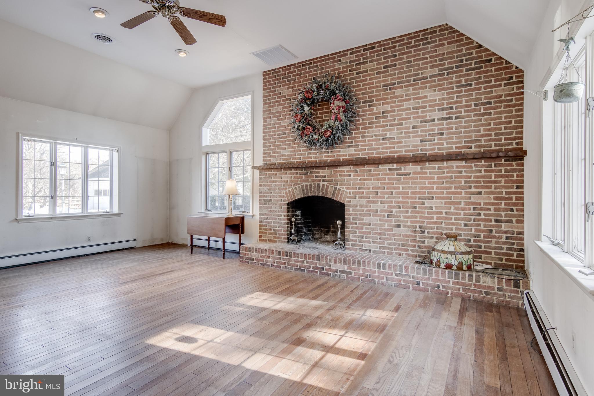 121 West Ring Factory Road Bel Air, MD 21014 - Photo 12 of 46 Large fireplace with solid wood mantle.