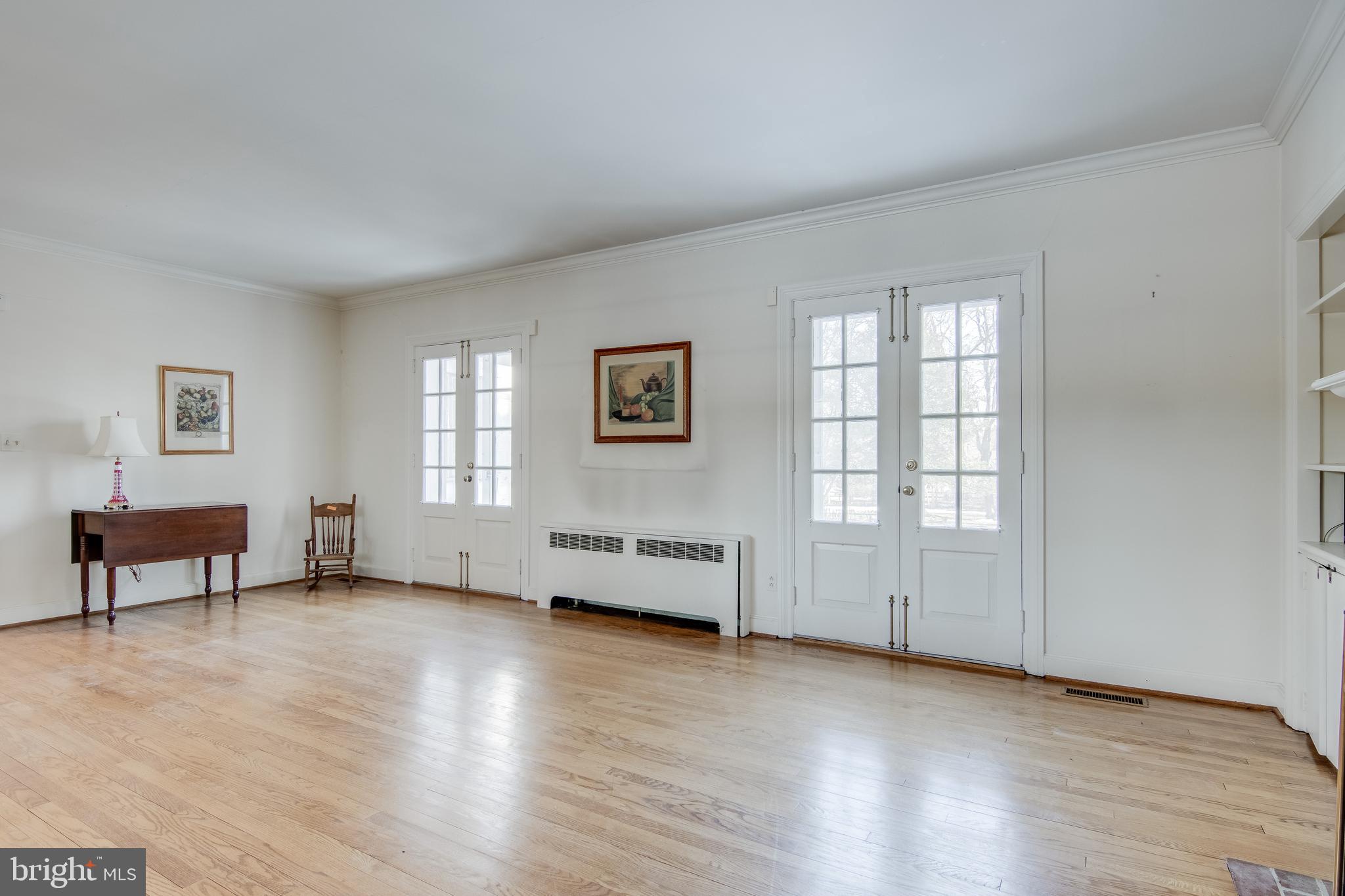 121 West Ring Factory Road Bel Air, MD 21014 - Photo 23 of 46 Living room has two double doors leading to patio,